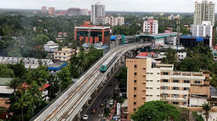 A Kochi Metro train leaves Changampuzha Park station during its trail run in Kochi