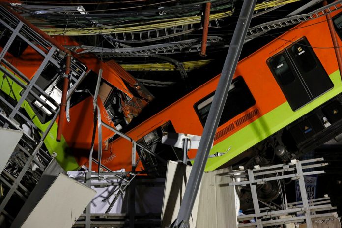 Mexico City rail overpass collapses onto road