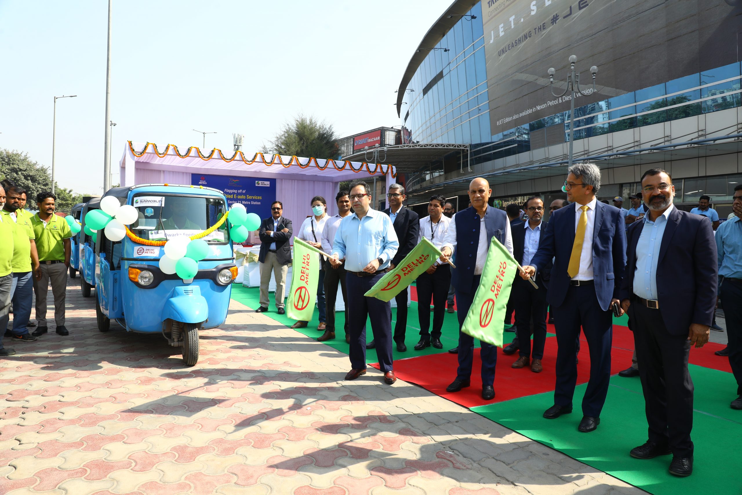 DMRC and SUN Mobility flag off a fleet of electric autos at Delhi scaled 1