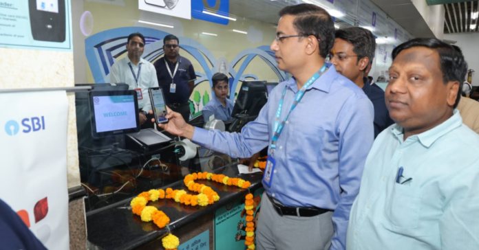 Dr. Lokesh M., IAS, Managing Director, NMRC launching QR Payment Facility